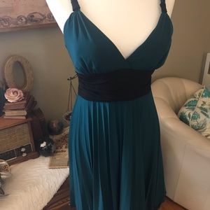 Green and black pleated cocktail dress